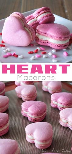 pink heart macarons are on a plate with sprinkles