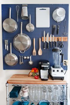 a magazine cover with kitchen utensils hanging on the wall