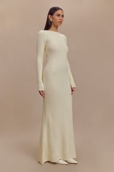 Elegant flow. The EMILY Long Sleeve Knit Maxi Dress is a stunning blend of modern elegance and timeless sophistication. Featuring a boat neckline and long sleeves, this dress creates a graceful, refined silhouette. The open back keyhole with a bow closure adds a touch of romantic detail, while the bodycon fit accentuates your curves. The flared hem provides a flowing, dramatic effect, and the maxi length ensures a glamorous finish. Crafted from ribbed knit and unlined, the Emily Dress offers bot White Sweater Dress Outfit, Long Sleeve Knit Maxi Dress, Workwear Capsule Wardrobe, Workwear Capsule, Capsule Wardrobe Basics, European Summer Outfits, Knit Maxi Dress, Maxi Dress Sale, Beige Dresses