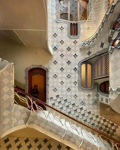 an artisticly designed staircase in a building