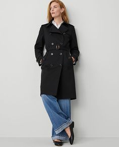 Elevate your wardrobe with the Ann Taylor Fitted Trench Coat, a perfect blend of style and functionality designed to keep you chic and dry, whatever the weather. This trench coat features a sophisticated black color and is tailored specifically for women, ensuring a flattering fit.

- **Size:** Large
- **Color:** Black
- **Material:** Shell: 78% Cotton, 20% Rayon, 2% Spandex; Lining: 100% Polyester
- **Gender:** Female
- **Features:** Notched lapel, long sleeves with button tabs, double-breasted Long Raincoat With Button Closure For Work, Classic Fall Workwear Raincoat, Classic Fall Raincoat For Work, Classic Belted Raincoat For Work, Classic Workwear Raincoat With Button Closure, Classic Button Closure Raincoat For Work, Classic Raincoat With Button Closure For Work, Elegant Raincoat For Workwear In Fall, Fitted Fall Workwear Raincoat