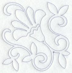 an embroidered design with swirls and leaves in white on a sheet of paper that says,