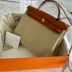 Condition New Color Beige Handbag Size Medium Height: 9.84 Inches / 25 Cm Width: 12.2 Inches / 31 Cm Depth: 3.94 Inches / 10 Cm Handle Drop: 2.76 Inches / 7 Cm Shoulder Strap Drop Max: 18.11 Inches / 46 Cm Brand New! Straight From The Showroom In Paris. Includes Clochette, Lock, Keys, Dust Bag And Box $3,500 Or Best Offer High-end Beige Shoulder Bag With Leather Handles, Light Luxury Beige Shoulder Bag For Travel, Designer Beige Bags With Leather Trim, Office Bags With Leather Trim In Beige, Beige Office Bags With Leather Trim, Elegant Beige Satchel With Leather Trim, Luxury Light Brown Bags With Leather Handles, Luxury Light Brown Bags With Handles, Luxury Light Brown Office Bag