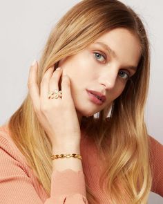 For a smooth and cultured style, choose the Gina Gold Chain Link Bracelet. Made with 14k gold-plated authentic sterling silver, the finish is one that shines with intensity. Chunky, oval-shaped links are connected with clear diamonette bedazzled bands to complete the look. With a double safety clasp to ensure it stays in place, this gorgeous piece exudes opulence for any occasion. By day, it adds a signature touch to your wardrobe while by night, it can bring out the elegance of any understated Chain Link Bracelet Silver, Affordable Jewelry, Love Is Free, Metal Earrings, Chain Link Bracelet, Link Bracelets, Chain Link, Gold Chain, Gold Chains