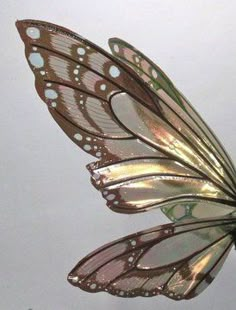 a close up of a butterfly flying in the air