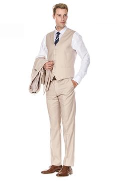 Bring understated elegance to the table in this three-piece suit crafted from rich fabric in a classic single-breasted silhouette. Jacket has notched lapels; chest welt pocket; front flap pockets Vest has front button closure; V-neck Pants have zip fly with button closure; front slant pockets; back button-welt pockets Jacket and vest are lined; trousers are lined to the knee 65% polyester, 35% viscose Dry clean Imported Each suit has a 6” drop, meaning that a size 38R jacket is paired with size Classic Beige Semi-formal Sets, Tailored Beige Suit In Suiting Fabric, Tailored Beige Suits In Suiting Fabric, Beige Three-piece Suit With Suit Collar, Beige Fitted Three-piece Suit For Semi-formal Occasions, Beige Business Suit With Collar, Fitted Beige Three-piece Suit For Business, Beige Tailored Notch Lapel Sets, Beige Tailored Set With Notch Lapel