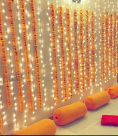 a room with lights and decorations on the wall