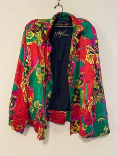 "Vintage Saks Fifth Avenue Peter Nygard Silk Jacket Size 6 Color-block Ladies Formal Attire Multi-color Long Sleeve Button Casual Jacket Oversized Vintage Peter Nygard 100% Silk Jacket With Gold Buttons. It Has Shoulder Pads And Still Has The Extra Button Included.  Condition:  In Excellent Used Condition! Beautiful Colors And Sophisticated Style! Measurements:   Ladies size:  6. (Runs big and can fit a person size 18)   Shoulder to shoulder:  19\"   Chest:  48\"   Inseam Sleeve Length:  19\" Trendy Multicolor Long Sleeve Windbreaker, Multicolor Long Sleeve Color Block Windbreaker, Vintage Multicolor Windbreaker For Spring, 90s Style Multicolor Patchwork Outerwear, 90s Patchwork Multicolor Outerwear, Vintage Multicolor Windbreaker For Fall, Retro Multicolor Windbreaker For Fall, Vintage Multicolor Fall Windbreaker, 90s Style Multicolor Fall Outerwear