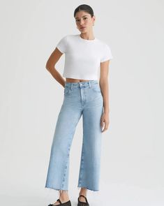 Our Saige Wide Leg Crop features a high-rise waist and loose, cropped legs with softly frayed raw hems. It's crafted from 11 oz. 360° Denim in a light blue wash that's been heavily faded and finished with a hint of distressing at the pockets. Vintage bi-stretch construction keeps these cropped wide-leg jeans feeling extra comfortable. 360° Denim, Vintage Bi-Stretch, 11 Oz. 97% Cotton, 3% Polyurethane Return Policy ALL regular price items may be returned for a store credit. Items must be received Types Of Jeans, Cropped Wide Leg Jeans, Women Denim Jeans, Spice Girls, Denim Pant, Wide Leg Jeans, Denim Women, Stretch Denim, Dress To Impress