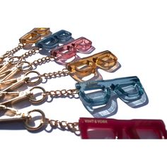 A perfect miniature replica of our bestselling frame, this new accessory will add a chic touch to your accessory game. Accessorize your bag, keys and more with our “mini-eyeglass” keycharms They clip-on as charms to any bag strap or can be used as a key chain ring and beyond. It is designed with a snap hook and crafted from the premium materials. They are available in a variety of stylish and on-trend colors. Designer Prescription Glasses, Brown Eyeglasses, Glasses Blue Light, Pink Eyeglasses, Unique Key, Eyewear Accessories, Chain Ring, Prescription Glasses, Bag Straps