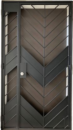 an open door with metal slats on the sides and black painted wood paneling