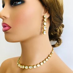 Bridal Kundan Necklace/Golden Meenakari Necklace/Kundan neckace/Indian/Pakistani/Wedding/Bollywood/Traditional/Kundan/Meenakari Jewelry Features 1-Traditional Kundan/Polki/Meenakari Necklace Set 2-Handcrafted To Perfection 3-Unique boutique design 4-A Beautiful & Memorable Gift for Weddings and Special Occasions 5-Earrings: 2.25 Inches ------------------------------------------------------- Click here for see more designs in our Kundan Necklace Sets and Jewelry Collection: https://www.etsy.c Gold Meenakari Kundan Jewelry Sets, Kundan Necklace With Gota Work, Gold Kundan Necklace With Stone Work, Bollywood Style Gold Kundan Necklace, Kundan Meenakari Necklace Gift, Gold Kundan Necklace With Gota Work Bollywood Style, Kundan Chandbali Temple Necklace With Meenakari, Kundan Chandbali Necklace With Gota Work, Temple Jewelry Kundan Necklace For Diwali