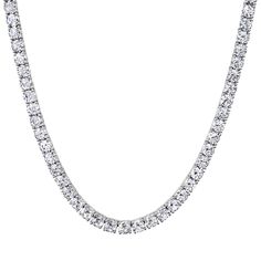 Make a statement on and off the court with this dazzling CZ Tennis Necklace-4MM. It's the perfect way to showcase your love for the game in a subtle but stylish way - it's simple but effective! Who said tennis couldn't be glamorous? Swing away in style! Sterling Silver, cubic zirconia SKU: FSE-26 (SS/CL) 4MM Luxury Iced Out White Gold Tennis Necklace, White Tennis Necklace With Sparkling Stones, White Tennis Necklace With Sparkling Stones Fine Jewelry, Classic White Cubic Zirconia Tennis Necklace, Fine Jewelry White Tennis Necklace With Sparkling Stones, White Fine Jewelry Tennis Necklace With Sparkling Stones, Classic White Tennis Necklace With Sparkling Stones, Classic Diamond White Tennis Necklace, Elegant Iced Out Tennis Necklace For Anniversary