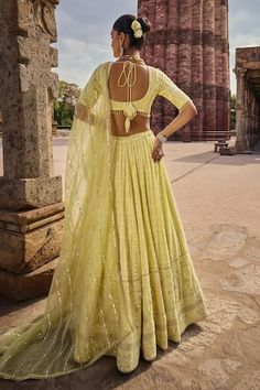 Yellow attached cancan lehenga with all over bahara bloom chikankari embroidery using sequin, cutdana embellishments in paisley bloom pattern. Paired with an elbow sleeves sequin-cutdana chikankari padded blouse and an organza gota striped, sequin embellished dupatta. - Aza Fashions Yellow Chikankari Embroidery Sharara For Reception, Yellow Chikankari Embroidered Sharara For Reception, Yellow Anarkali Set With Chikankari Embroidery For Reception, Yellow Semi-stitched Lehenga With Motifs, Semi-stitched Yellow Lehenga With Motifs, Yellow Chikankari Embroidered Floor-length Lehenga, Yellow Chikankari Embroidery Saree For Reception, Traditional Georgette Choli With Motifs, Traditional Drape Georgette Choli With Motifs