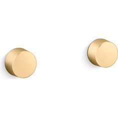 two gold studs on white background with one in the center and one in the middle