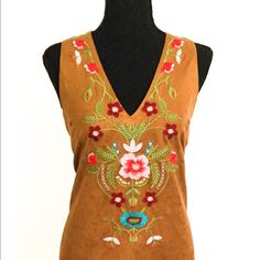 This Bohemian Beauty Is Unique With Its Embroidered Front Panel And Sueded Lightweight Fabric. The Arms Are Sleeveless With A V- Neck. New - Never Worn Item. Available In S-L Sizes. Spring Bohemian Sleeveless Embroidered Dress, Sleeveless Embroidered Dress With Floral Print, Bohemian Sleeveless Embroidered Dress For Spring, Bohemian Embroidered Sleeveless Fitted Dress, Sleeveless Bohemian Embroidered Dress, Fitted Sleeveless Bohemian Embroidered Dress, Sleeveless Fitted Embroidered Dress For Festival, Fitted Sleeveless Embroidered Festival Dress, Fitted Sleeveless Embroidered Dress For Festival