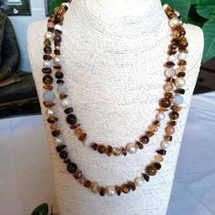 Gorgeous Long Newly Made Gemstones Pearls And Crystals Necklace-Trendy Long, Made With Quality Materials And Toggle Clasp. Wear It Fashionably Long Or Double Down For A Classic Style. Tiger Eye, Pearls And Hand Polished Crystals. This Color Combination Goes With A Lot Of Things. Elegant Brown Crystal Necklace With Adjustable Fit, Elegant Adjustable Brown Crystal Necklaces, Elegant Brown Necklace With Stones, Elegant Brown Crystal Necklace, Elegant Brown Crystal Necklace With Gemstone Beads, Elegant Brown Crystal Necklaces With Natural Stones, Eye Pearls, Polished Crystals, Crystals Necklace