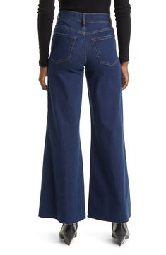 A dark wash and light sanding bring well-loved appeal to high-waist jeans cut from soft stretch denim in a wide-leg silhouette with raw hems. 28" inseam; 14" leg opening; 12" front rise; 15" back rise (size 29) Zip fly with button closure Five-pocket style X" inseam; X" leg opening; X" front rise; X" back rise (size 29) Machine wash, dry flat Made in Turkey Chic Dark Wash Wide Leg Jeans, Chic Dark Wash Flare Cropped Jeans, Dark Wash Denim Wide Leg Pants For Fall, Flared Denim Blue Wide Leg Pants, Style Upgrade, Teacher Outfits, Waist Jeans, Nordstrom Store, Anniversary Sale