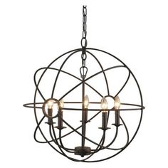 a chandelier with five lights hanging from it's metal frame and circular design