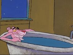 a cartoon character laying in a bath tub