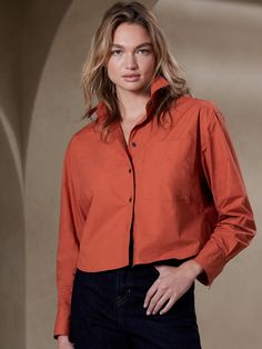 Crisp and light, our signature cotton poplin has a smooth feel against the skin, used here in an almost-cropped silhouette that’s perfect for playing with proportions.  Pair it with high-waisted jeans for casual days, or try it with a flowing midi Fall Cropped Shirt With Pockets, Trendy Cropped Shirt For Work, Casual Cropped Shirt For Work, Trendy Cropped Shirt For Workwear In Fall, Trendy Cropped Shirt For Spring, Versatile Everyday Shirt For Fall, Versatile Everyday Fall Shirt, Chic Cropped Shirt For Fall, Versatile Shirt With Shirttail Hem For Fall