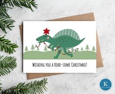 a christmas card with an image of a dinosaur