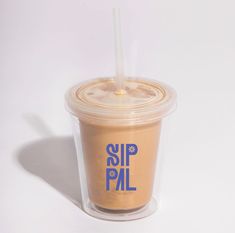 a plastic cup with a straw in it