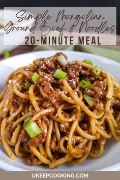 a white plate topped with noodles and ground beef next to a cup of coffee on a wooden table