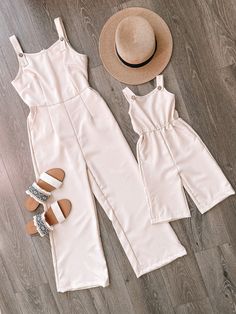 "This M O M M Y + M E jumpsuit is MUST HAVE this summer! Plus, it has pockets I T E M D E S C R I P T I O N * Material: 95% Polyester 5% Spandex * Sizing runs true to size * Back off-white zipper * It has pockets!! * Calf length * Sizing runs true to size. We only recommend sizing up if you would some extra wiggle room. * Infant sizes include snaps between the legs to make diaper changes easy and fuss-free. S I Z I N G Adult: S: Length 52.5\" | Chest 34\" | Waist 29\" | Leg width 10.5\" M: Lengt Spring Casual Jumpsuits And Rompers Matching Set, Casual Sleeveless Jumpsuit And Romper Matching Set, Casual Sleeveless Jumpsuits And Rompers Matching Set, Casual Sleeveless Jumpsuit And Romper Set, Summer Day Out Matching Set Jumpsuits And Rompers, Matching Mommy Daughter Outfits, Mommy And Me Matching Outfits, Mommy Daughter Outfits, Outfits Matching