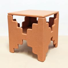 a small table made out of clay