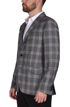 A rich glen plaid print distinguishes this woven sport coat that'll make a dapper statement to top off any look. Two-button closure Notched lapels Chest welt pocket; front flap welt pockets 70% polyester, 30% rayon Dry clean Imported Formal Plaid Blazer With Hidden Button Closure, Formal Plaid Blazer With Hidden Buttons, Tailored Plaid Sport Coat With Suit Collar, Plaid Sport Coat With Lapel Collar And Hidden Buttons, Plaid Single Breasted Sport Coat With Notch Lapel, Formal Single Breasted Plaid Outerwear, Plaid Sport Coat With Lapel Collar For Formal Occasions, Plaid Single-breasted Sport Coat With Notch Lapel, Tailored Single-breasted Plaid Sport Coat