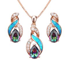 PRICES MAY VARY. ♥ Dazzling Stones: The created opal gemstones in this necklace and earrings set are expertly cut and designed to catch the light for maximum shine. The opals come in a variety of colors, including blue, and white. ♥ Elegant Design: This set features a special 8 design, paired with topaz to enhance its shine and shine, making it perfect for special occasions or daily wear. ♥ High-Quality Materials: Lab-created opals and hypoallergenic, tarnish-resistant necklace chain for lasting Opal Jewelry Set, Australian Opal Jewelry, Jewelry For Mom, Cheap Necklaces, Big Jewelry, Opal Pendant Necklace, Buy Necklace, Women's Jewelry Sets, Gifts Jewelry