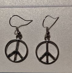 Silver Plated Peace Sign Earrings with Hypoallergenic Hooks, there are 4 pairs avaliable. If you have any questions or concerns please send me a message <3  Please note, if you have ordered from outside the UK, your order may take up to 6 weeks to arrive due to customs. Unless you have selected tracked delivery i am unable to locate your order after shipping. if you order has not arrived after 6 weeks please vet me know so i can issue you a refund. Please let me know when your order arrives so I Casual Metal Hypoallergenic Jewelry, Casual Hypoallergenic Metal Jewelry, Casual Metal Earrings With Ear Wire, Casual Adjustable Nickel-free Earrings, Casual Round Hypoallergenic Earrings, Casual Hypoallergenic Round Earrings, Casual Hypoallergenic Earrings, Nickel Free Casual Jewelry, Nickel-free Round Casual Jewelry