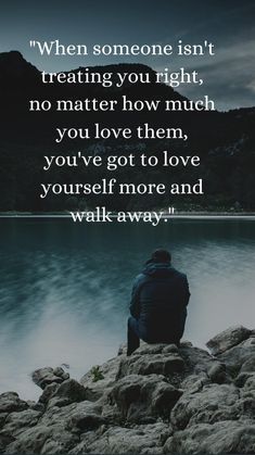 a man sitting on top of a rock next to the ocean with a quote about love