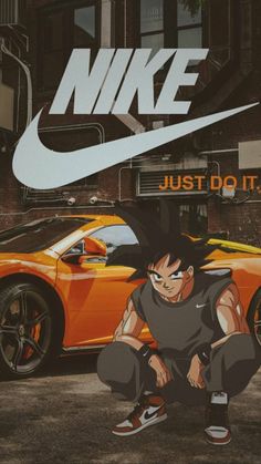 a man squatting in front of a sports car with the words nike just do it