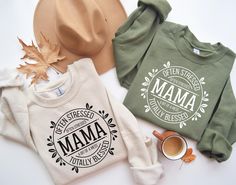 Mama Sweatshirt, Mama Often Stressed Shirt, Mama a Bit of a Mess Tshirt, Mama Totally Blessed, Retro Mom Hoodie, Mama Sweat, Gift for Mom *HOW TO ORDER* 1. Select the shirt 𝗦𝘁𝘆𝗹𝗲 2. Select the 𝗦𝗶𝘇𝗲 3. Select the shirt color 4. Select the quantity, 5. Click 𝗔𝗗𝗗 𝗧𝗢 𝗖𝗔𝗥𝗧. If you want to buy more than one, please go back to the listing and repeat the steps. "If you have any question, please send us a message." *BRAND* If you want a specific brand, please send us a message right aft Cotton Sweatshirt With Lettering For Gift, Fall Letter Print Hoodie As Gift, Cotton Pre-shrunk Sweatshirt As Gift, Fall Letter Print Hoodie Gift, Cotton Tops As Fall Gift, Cotton Top For Fall, Cotton Sweater With Graphic Print As Gift, Graphic Print Cotton Sweater As Gift, Cotton Sweater As Fall Gift