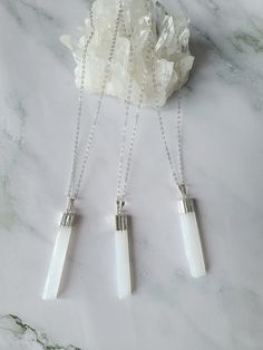 Pure and elegant selenite crystal necklace.  This cleansing pendant comes on a sterling silver cable chain that is available in 3 lengths. Wear this natural selenite pendant on its own or pair it up for that gorgeous layering look. The selenite crystal is not only beautiful but a translucent crystal that evokes energies of healing and protection. Selenite is a cleansing crystal that purifies, clears, and gives off positive energy. The soft white appearance of the stone is a perfect reflection of its gentle but highly effective energy, which emits white light and high vibrations. Free shipping within Canada is not tracked. If you would like tracked shipping, you can select at checkout for an additional amount.