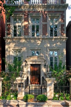 a large brick building with many windows and balconies