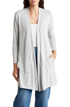 Love to layer this longline cardigan knit with an open front from supremely soft yarns. 33" length (size Small) Open front Long sleeves 95% polyester, 5% spandex Machine wash, dry flat Imported Model stats: 5'10", 32" bust, 25" waist, 36" hip. Model is wearing size Small. Lightweight Casual Cardigan For Layering, Lightweight Casual Open Front Cardigan, Versatile Gray Cardigan For Layering, Versatile Stretch Cardigan For Layering, Lightweight Long Sleeve Casual Cardigan, Versatile Open Front Cardigan For Layering, Lightweight Open Front Cardigan For Fall, Spring Stretch Cardigan For Everyday, Spring Everyday Stretch Cardigan