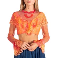 Absolutely ethereal corset top with lace layering and sheer sleeves. Laces in back with button clasp behind neck. Hand dyed for a lovely ombre orange/red look. Perfect for a festival! Measurements Bust: 34-36" Waist: 30" Length: 14" Sleeve Length: 26" Condition: Excellent; differences in color due to dyeing process Fitted Red Lace Top, Summer Lace Top With Sheer Sleeves, Fitted Lace Crop Top For Festival, Fitted Long Sleeve Mesh Top For Festival, Fitted Lace Trim Crop Top For Festival, Fitted Bohemian Top With Lace Sleeves, Fitted Crop Top With Lace Trim For Festival, Fitted Bohemian Lace Top For Festival, Lace Top For Festival