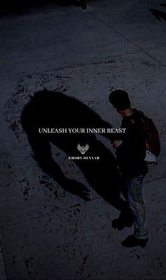 a man standing in the dark with his shadow on the ground and text underneath him that reads, unleash your inner beast