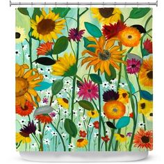 a shower curtain with sunflowers and daisies