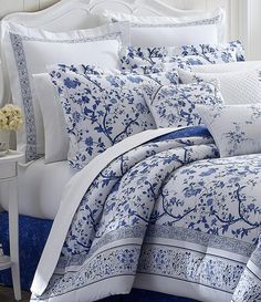 the blue and white bedding is on sale