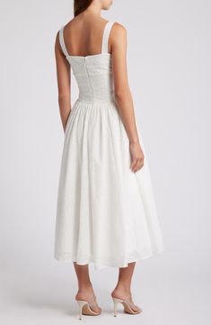 Eyelet and ribbon lacing adds an edgy touch to a vintage-inspired sundress boasting a bustier-style bodice and flared midi skirt. Exclusive retailer Square neck Side patch pockets Lined 77% viscose, 21% polyester, 2% elastane Dry clean Imported House Of Cb White Dress, Elopement Dresses, Flared Midi Skirt, Halter Sundress, Midi Sundress, Elopement Dress, Midi Flare Skirt, Floral Sundress, Lace Corset