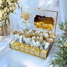 a box filled with lots of different types of candies on top of a table