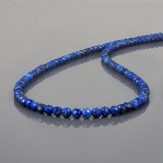 Lapis Lazuli Necklace Shape- Round Faceted Size-4 mm Metal- Sterling Silver 925 Length- 45 cm Weight- 30ct. AAA Quality Lapis Beaded Necklace ,Natural Lapis Necklace,Lapis Gemstone Necklace,Blue Gemstone Necklace,Round Faceted Lapis jewelry gift All of my jewelry is designed and handcrafted by me. I love to experiment with many different designs and although I may make similar designs more than once, each piece of jewelry is truly one of a kind due to variations between gemstones and within my o Round Faceted Beads Gemstones As Gift, Lapis Lazuli Gemstone Beads Crystal Necklace, Round Faceted Beads Gemstones For Gifts, Round Faceted Gemstones For Healing, Lapis Lazuli Crystal Necklace With Gemstone Beads, Healing Faceted Round Gemstones, Spiritual Faceted Beaded Necklaces, Lapis Lazuli Necklace With Faceted Beads, Round Lapis Lazuli Necklace With Faceted Beads