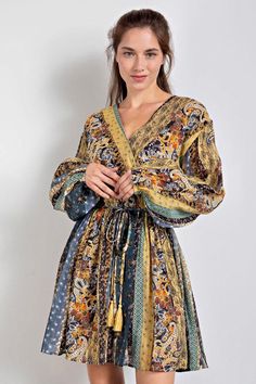 This lightweight, lined, printed dress features a wrap look surplice bodice with snap closure, v-neckline, long bubble sleeves, gathered skirt, and elastic waist with tie. Voile Dress, Gathered Skirt, Hello Beautiful, Pattern Mixing, Printed Dress, Green And Gold, Green Dress, Snap Closure, Print Dress