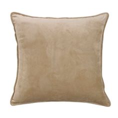 a beige pillow on a white background