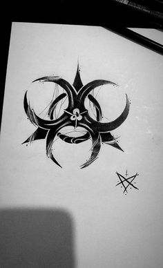 a black and white drawing of a biohazard design on a piece of paper