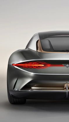 the rear end of a silver sports car